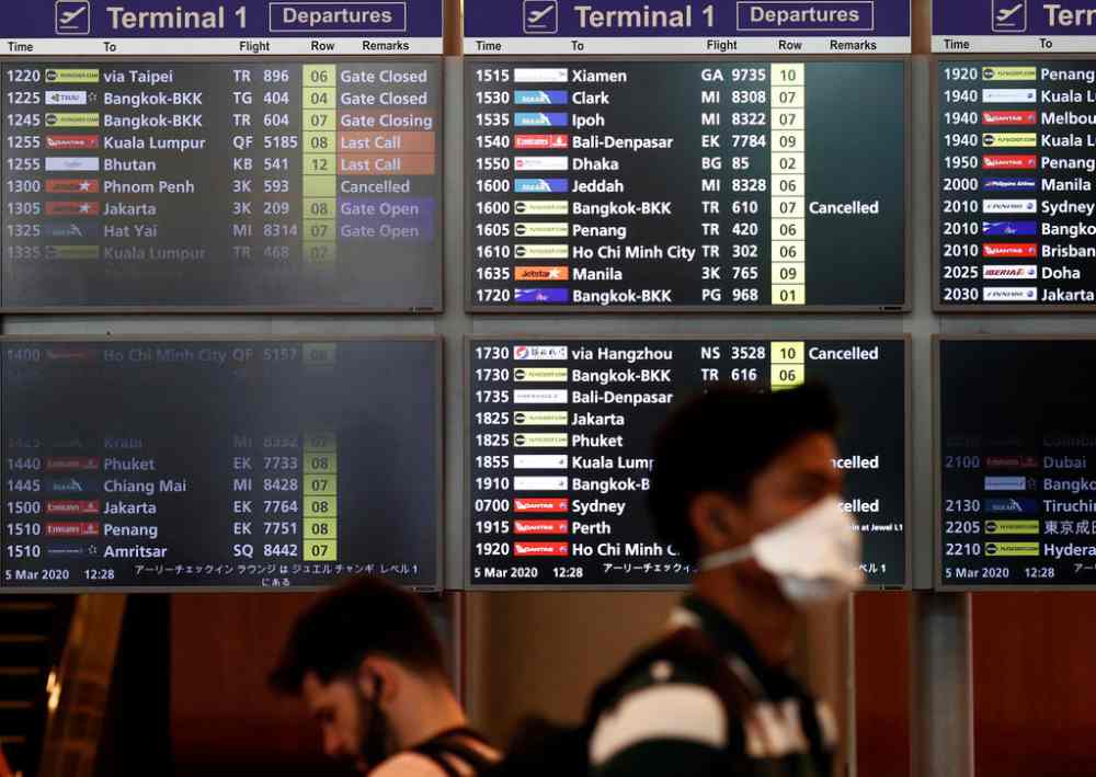 Travellers are seen at the Changi Airport in Singapore. u00e2u20acu2022 Reuters picn