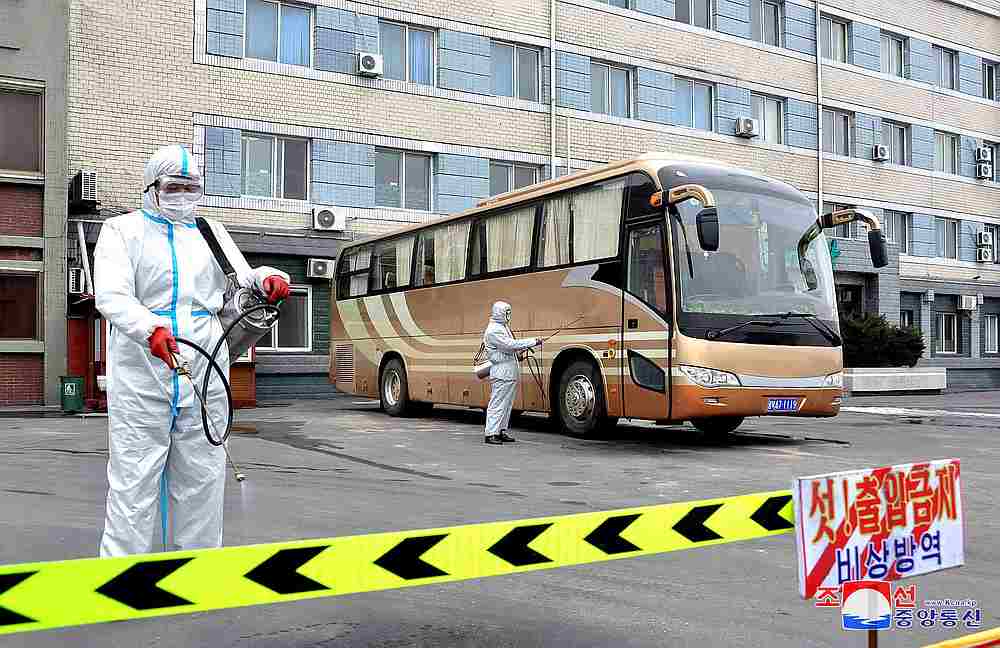 Volunteers carry out disinfection work during an anti-virus campaign in Pyongyang, North Korea in this image released March 4, 2020. The country has not reported a single case of Covid-19. u00e2u20acu201d KCNA pic via Reuters