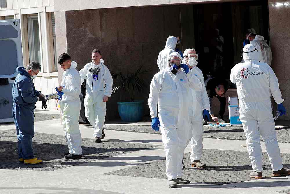 Workers dressed in protective garments prepare to sanitise a regional building as Italy seeks to contain a coronavirus outbreak in Rome, Italy March 8, 2020. u00e2u20acu201d Reuters pic