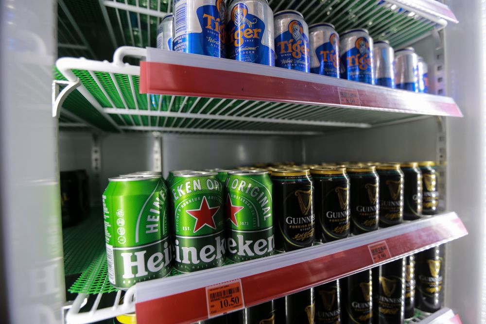 Beer for sale at a convenience store in Petaling Jaya March 25, 2020. u00e2u20acu201d Picture by Ahmad Zamzahuri