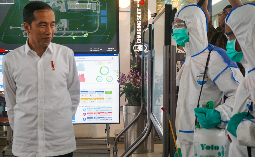 Indonesian President Joko Widodo inspects Jakarta International airport in Tangerang March 13, 2020, of its preparation to fight against any spread of the Covid-19 coronavirus outbreak. u00e2u20acu201d AFP pic 