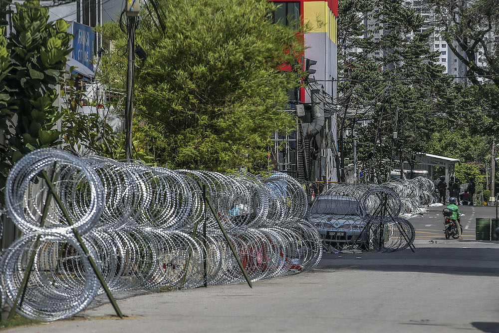 Selayang Baru, classified as a red zone, is deserted during the enhanced movement control order (EMCO), April 25, 2020. u00e2u20acu201d Picture by Hari Anggara