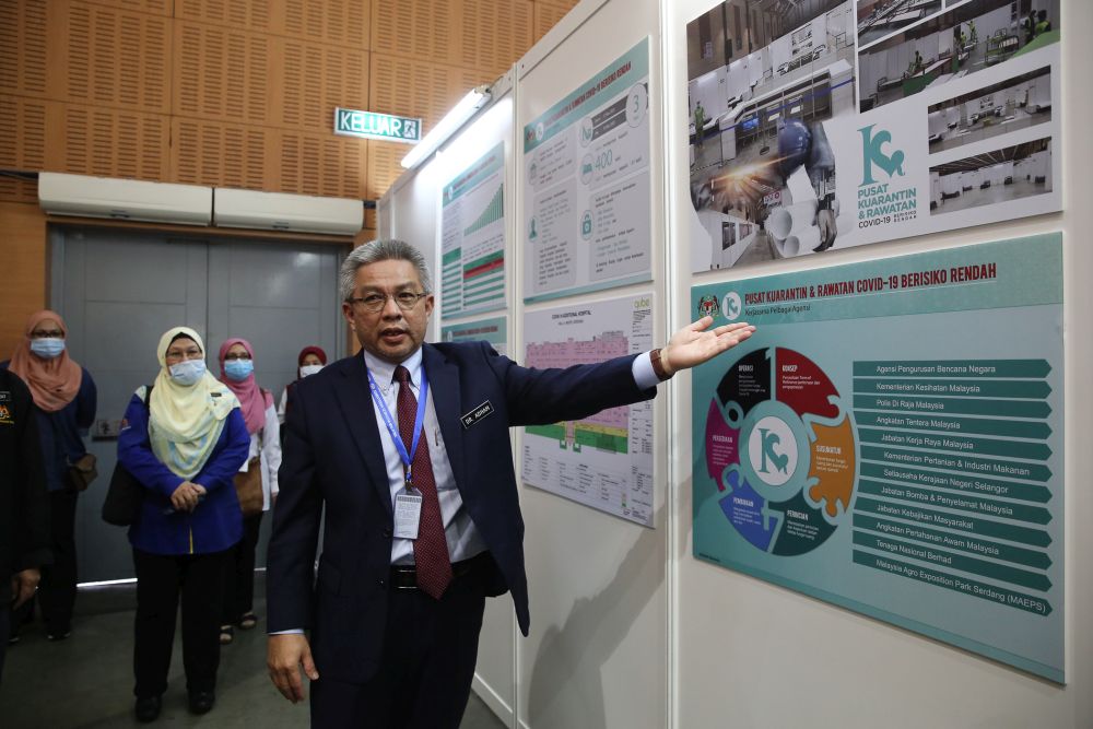 Health Minister Datuk Seri Dr Adham Baba speaks to reporters at the low-risk Covid-19 quarantine and treatment centre at the Malaysia Agro Exposition Park Serdang April 3, 2020.  u00e2u20acu201d Picture by Yusof Mat Isa