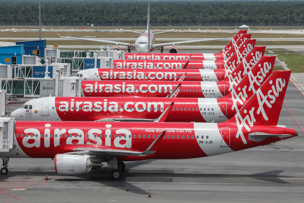 AirAsia planes are seen parked at Kuala Lumpur International Airport 2, during the movement control order due to the outbreak of the coronavirus disease (Covid-19), in Sepang, Malaysia April 14, 2020. u00e2u20acu201d Reuters pic