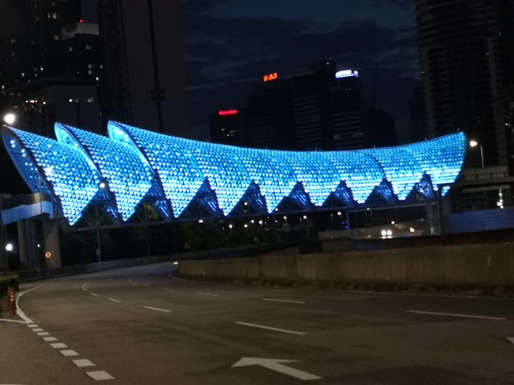 The Saloma Link is illuminated in blue lights in a show of solidarity for frontliners battling the Covid-19 outbreak. u00e2u20acu201d Picture via Twitter/Annuar Musa