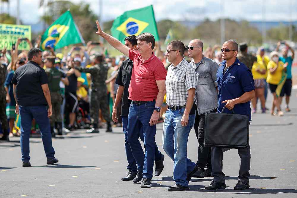 Brazil's President Jair Bolsonaro gestures after joining supporters to protest against quarantine and social distancing measures, amid the Covid-19 outbreak, in Brasilia, Brazil April 19, 2020. u00e2u20acu201d Reuters pic