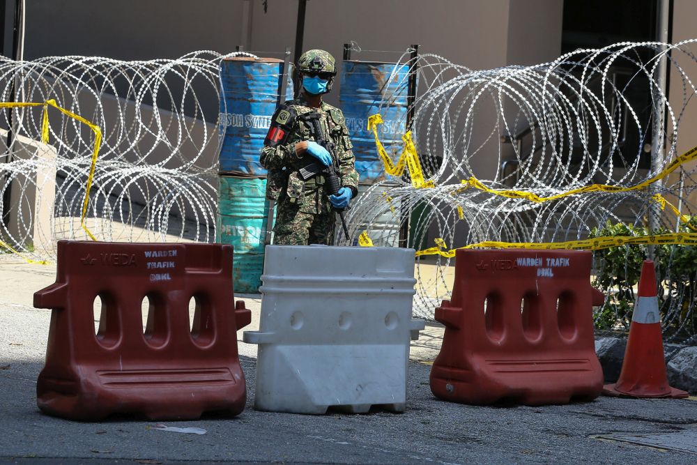 An Armed Force personnel stands guard on Jalan Masjid India in Kuala Lumpur April 16, 2020. u00e2u20acu201d Picture by Yusof Mat Isa