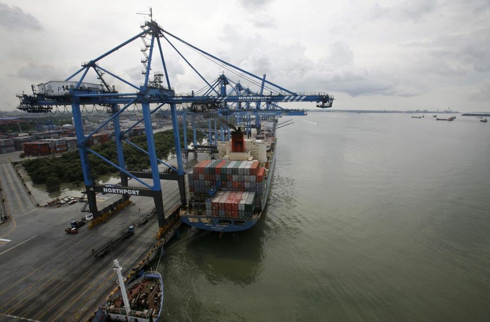 File picture shows a container ship being anchored at North Port in Port Klang outside Kuala Lumpur January 8, 2009. u00e2u20acu201d Reuters pic