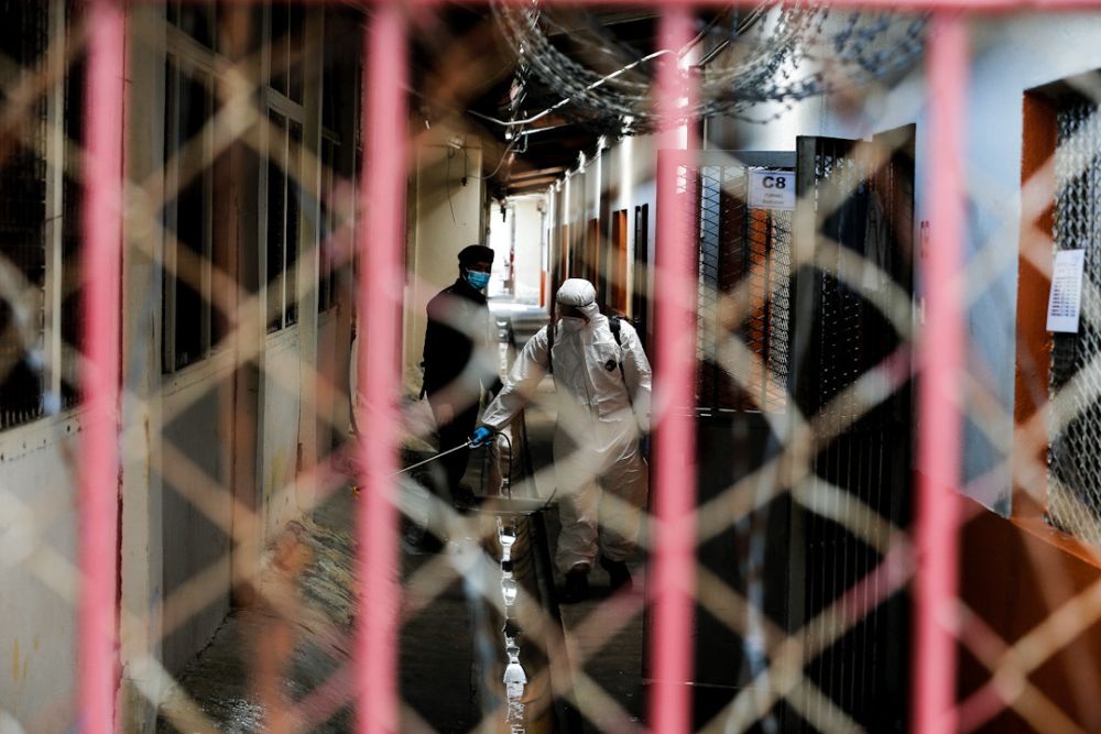 A Fire and Rescue Department personnel sprays disinfectant during sanitisation work at the Penang Prison April 15, 2020. u00e2u20acu201d Picture by Sayuti Zainudin