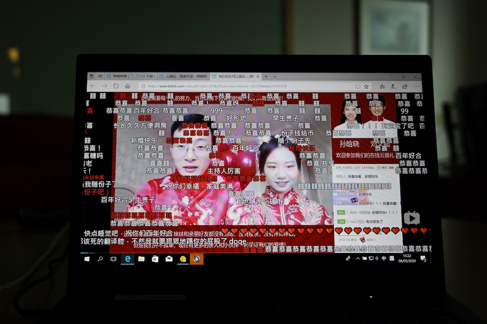 A recording of a livestream of the wedding of Liu Wenchao and Sun Hanxiao is seen on a laptop screen in Beijing May 8, 2020. u00e2u20acu201d AFP pic