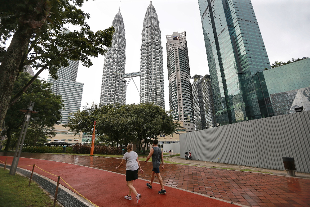 A view of people jogging at the KLCC park in Kuala Lumpur May 4, 2020. u00e2u20acu201d Picture by Ahmad Zamzahuri
