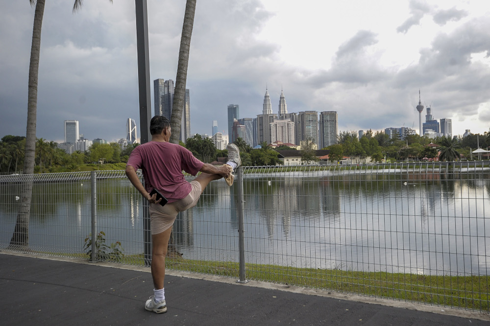 Mr Ong, 68, is seen exercising at the Titiwangsa lake park in Kuala Lumpur May 4, 2020. u00e2u20acu201d Picture by Shafwan Zaidon