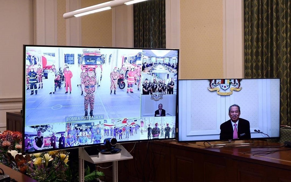 Prime Minister Tan Sri Muhyiddin Yassin (right) during a 30-minute video conference with representatives of the countryu00e2u20acu2122s frontliners who have been battling the Covid-19 pandemic, in Putrajaya May 22, 2020. u00e2u20acu201d Picture via Facebook/Muhyiddin Yassin