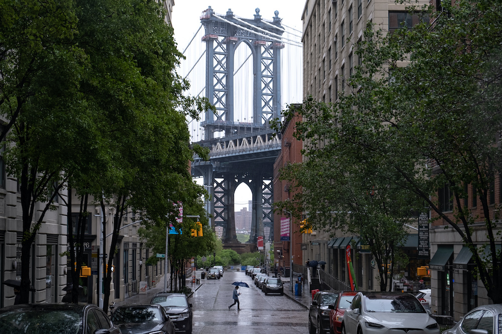 A pedestrian walks past on Washington Street in Dumbo neighbourhood of Brooklyn as streets remain less busy due to the continuing outbreak of the coronavirus disease (Covid-19) in New York May 23, 2020. u00e2u20acu201d Reuters pic