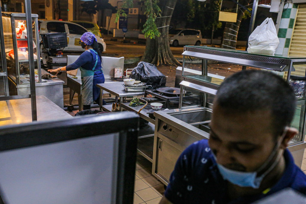 A general shot of a restaurant cleaning up in the Bukit Bintang area in Kuala Lumpur during the CMCO May 6, 2020. u00e2u20acu201d Picture by Hari Anggara