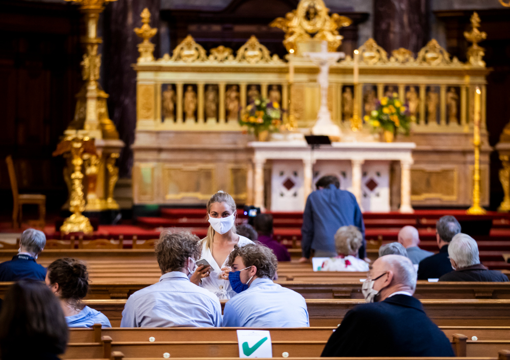 Members of the congregation wear face masks and observe social during a Sunday service at the Berliner Dom cathedral in Berlin May 10, 2020, amid the Covid-19 coronavirus pandemic. u00e2u20acu201d AFP pic 