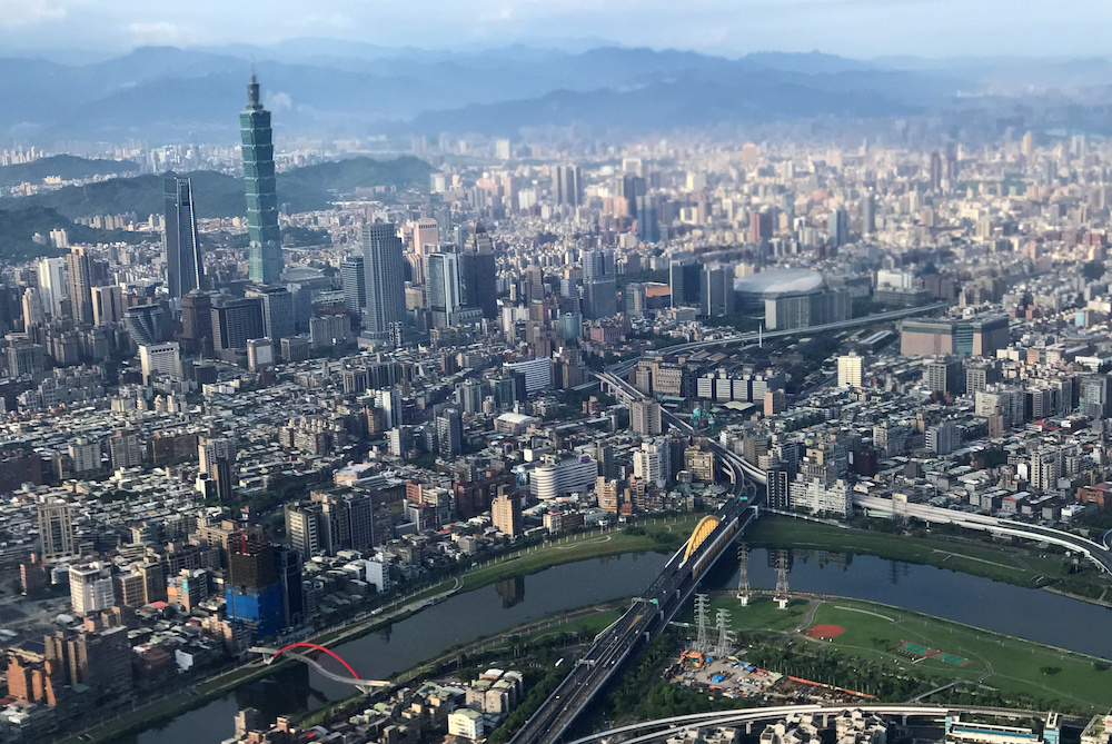 Nan Shan Plaza and Taiwanu00e2u20acu2122s landmark building Taipei 101 are pictured through the window of an airplane, in Taipei, Taiwan August 19, 2018. u00e2u20acu201d Reuters picnn