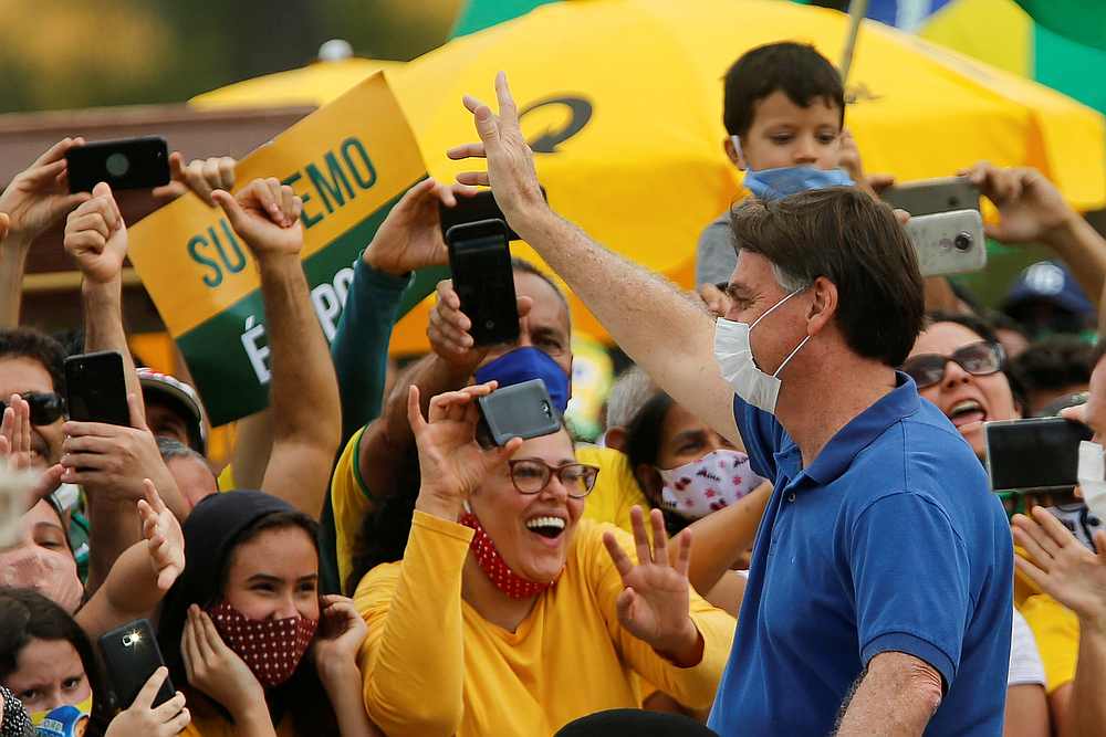 Brazil's President Jair Bolsonaro greets supporters, amid the Covid-19 outbreak, in Brasilia May 17, 2020. u00e2u20acu201d Reuters pic