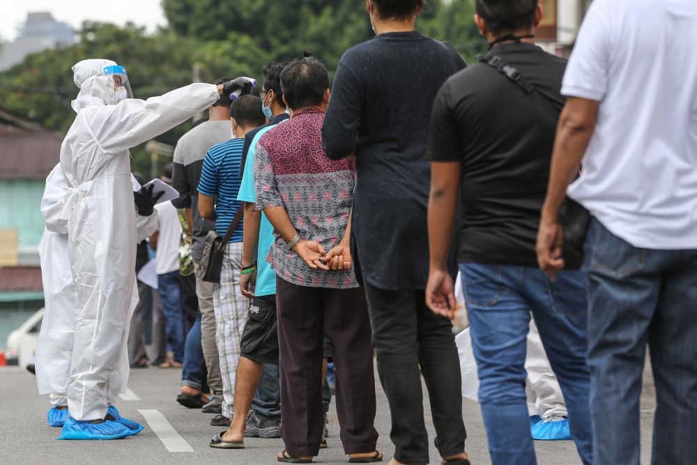 People queue up to be tested for Covid-19 at Chow Kit, Kuala Lumpur May 6, 2020. u00e2u20acu201d Picture by Yusof Mat Isa