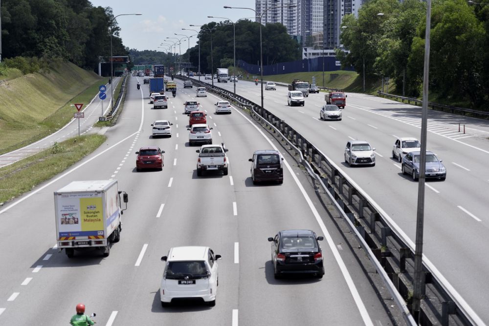 A general view of traffic on the Federal Highway in Shah Alam during the second day of the conditional movement control order May 5, 2020. u00e2u20acu201d Picture by Miera Zulyana