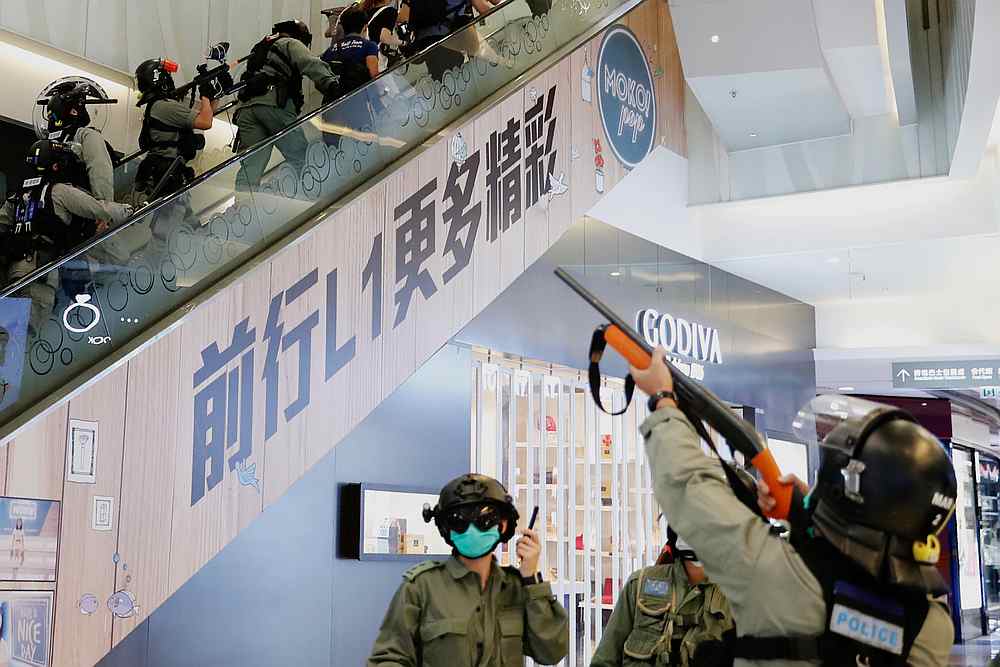 Riot police raise their pepper spray projectile inside a shopping mall as they disperse anti-government protesters during a rally, in Hong Kong May 10, 2020. u00e2u20acu201d Reuters pic