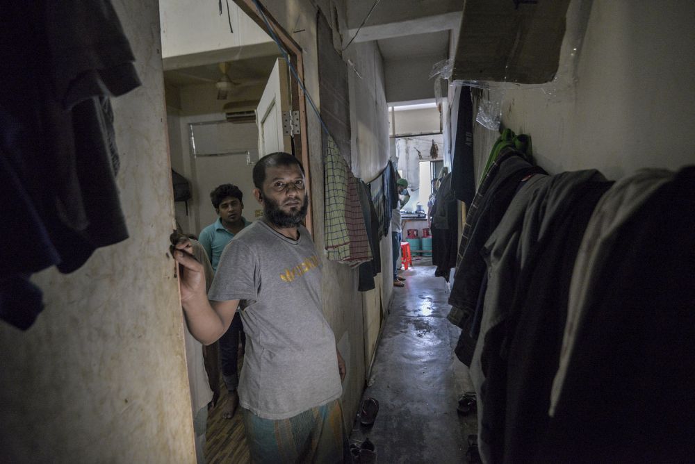 The narrow corridor in the apartment where nine Bangladeshis live.  u00e2u20acu201d Picture by Shafwan Zaidon