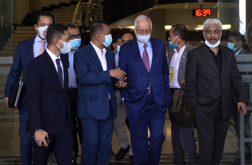 Datuk Seri Najib Razak leaves Kuala Lumpur High Court after his 1MDB trial May 19, 2020. u00e2u20acu201d Picture by Miera Zulyana