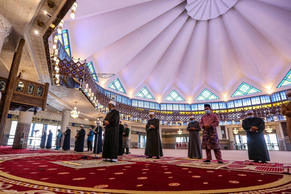 National Mosque High Priest Ehsan Mohd Husni leads Friday prayers at the National Mosque in Kuala Lumpur May 15, 2020. u00e2u20acu201d Picture by Hari Anggara