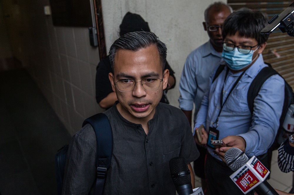 PKR communications director Fahmi Fadzil speaks to the press after a meeting with fellow Pakatan Harapan leaders in Petaling Jaya June 12, 2020. u00e2u20acu201d Picture by Firdaus Latif 