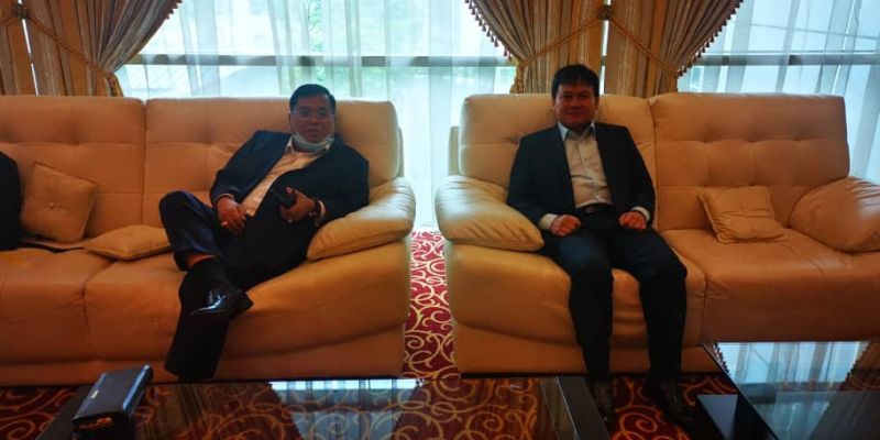 Lubok Antu MP Jugah Muyang (left) with Saratok MP Ali Biju at the Kuching International Airport this evening. u00e2u20acu201d Picture courtesy of Vernon Kedit