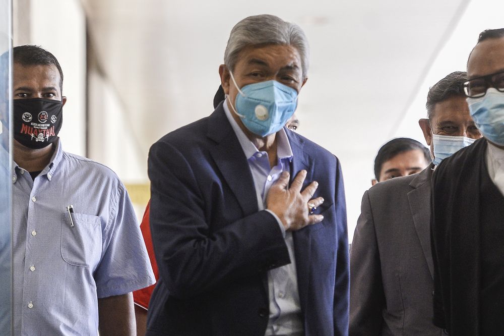 Datuk Seri Ahmad Zahid Hamidi (centre) is pictured at the Kuala Lumpur High Court June 16, 2020. u00e2u20acu201d Picture by Miera Zulyana