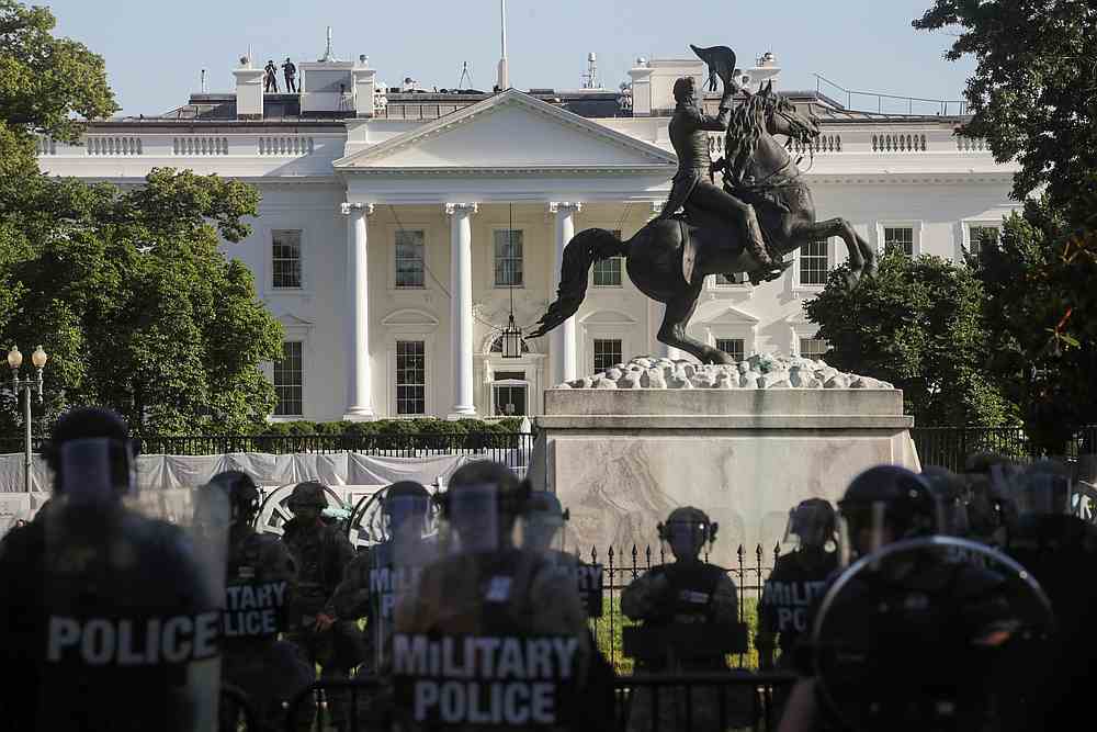 National Guard military police officers stand guard as demonstrators rally near the White House against the death in police custody of George Floyd, in Washington June 1, 2020. u00e2u20acu201d Reuters pic