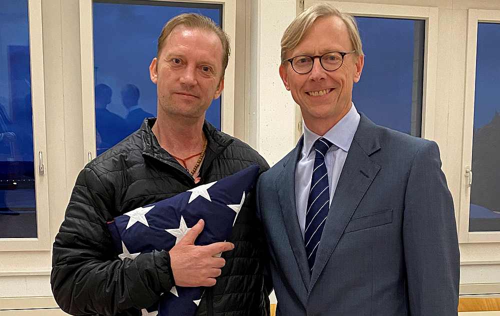 Michael White (left), a freed US Navy veteran detained in Iran since 2018, with US Special Envoy for Iran Brian Hook at Zurich Airport, Switzerland June 4, 2020. u00e2u20acu201d US State Department handout via Reuters