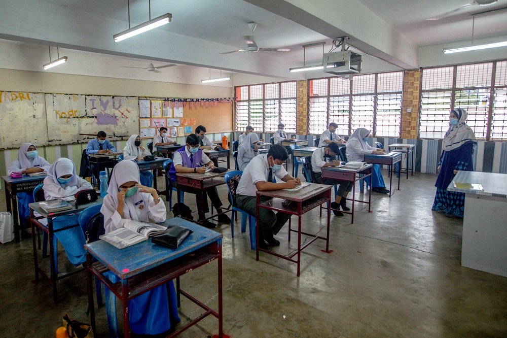 Social distancing is observed in the classroom at SMK Lembah Keramat Jaya in Kuala Lumpur June 24, 2020. u00e2u20acu2022 Picture by Firdaus Latif