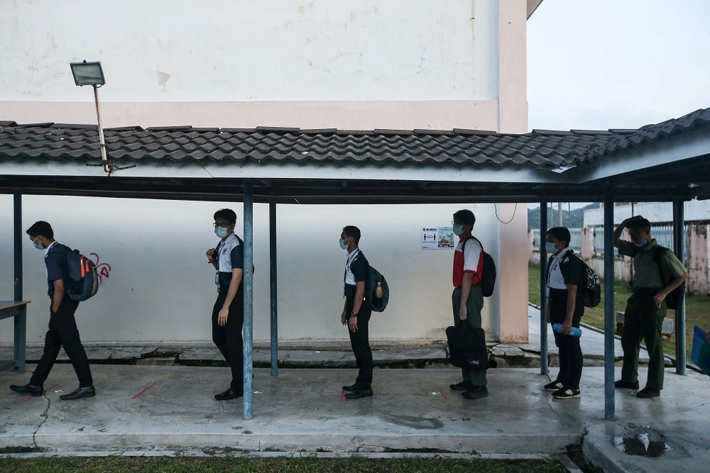 Students practice social distancing at SMK Anderson in Ipoh June 24, 2020. u00e2u20acu2022 Picture by Farhan Najib