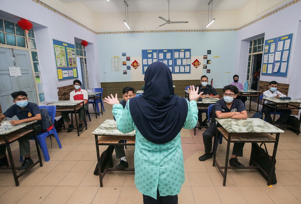 Social distancing is observed in the classroom at SMK Anderson in Ipoh June 24, 2020. u00e2u20acu2022 Picture by Farhan Najib