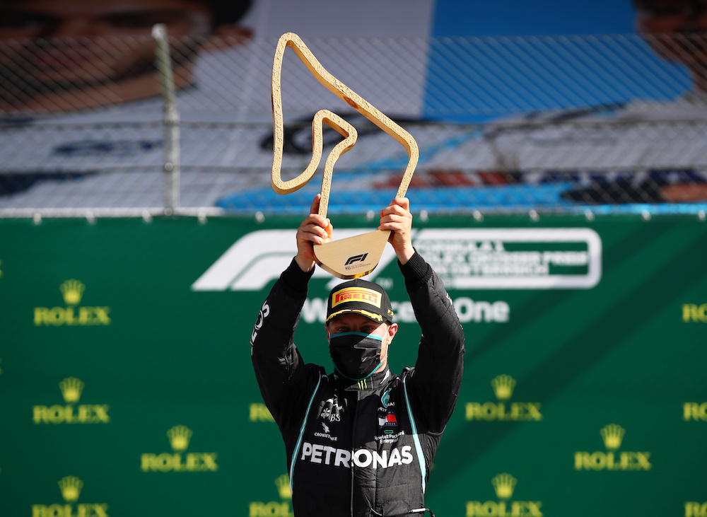 Mercedes' Valtteri Bottas celebrates with the trophy on the podium after winning the Austrian Grand Prix race, as F1 resumes following the outbreak of the coronavirus disease in Styria, Austria July 5, 2020. u00e2u20acu201d Reuters pic