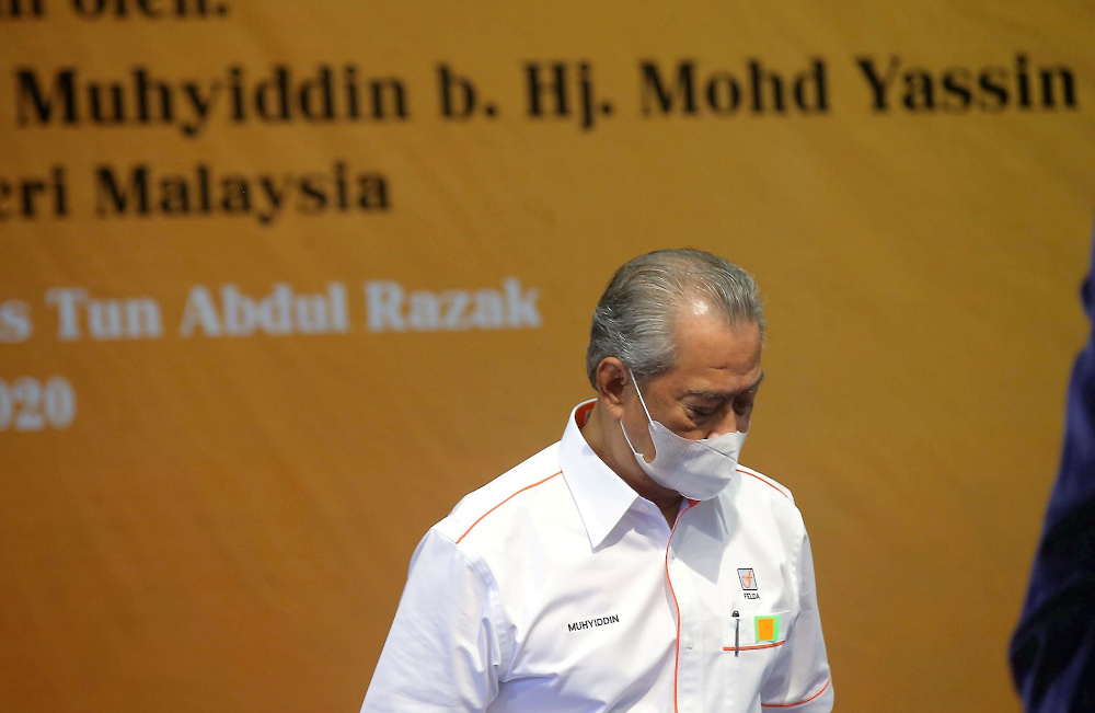 Prime Minister Tan Sri Muhyiddin Yassin arrives at the national level 2020 Felda Settlers Day at the Felda Mara Junior Science College (MRSM) Tun Abdul Razak Campus in Trolak July 7, 2020. u00e2u20acu201d Picture by Farhan Najib 