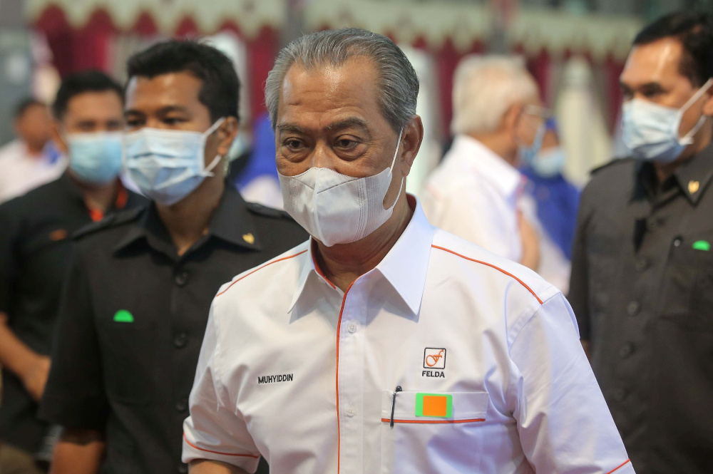 Prime Minister Tan Sri Muhyiddin Yassin arrives at the national level 2020 Felda Settlers Day at the Felda Mara Junior Science College (MRSM) Tun Abdul Razak Campus in Trolak July 7, 2020. u00e2u20acu201d Picture by Farhan Najib 