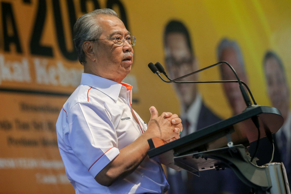 Prime Minister Tan Sri Muhyiddin Yassin speaks during the national level 2020 Felda Settlers Day at the Felda Mara Junior Science College (MRSM) Tun Abdul Razak Campus in Trolak July 7, 2020. u00e2u20acu201d Picture by Farhan Najib 