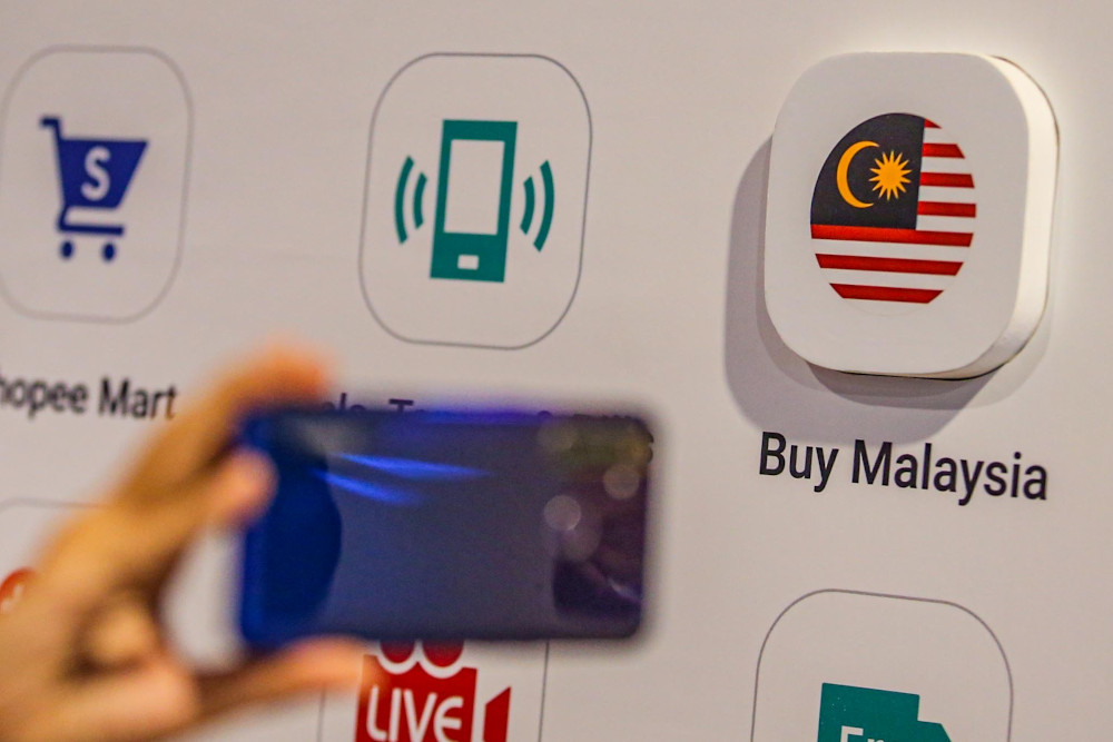 Shopee推出了Buy Malaysia应用程式，以让消费者能够更加认识马来西亚的产品以及企业。-Hari Anggara摄-