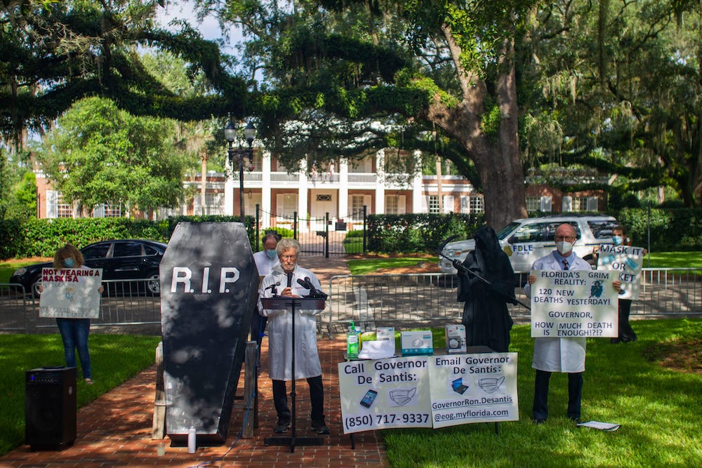 Physicians for Social Responsibility board members gathered outside the Florida Governor's Mansion demanding Gov. DeSantis mandate masks statewide Friday, July 10, 2020. u00e2u20acu201d Reuters pic