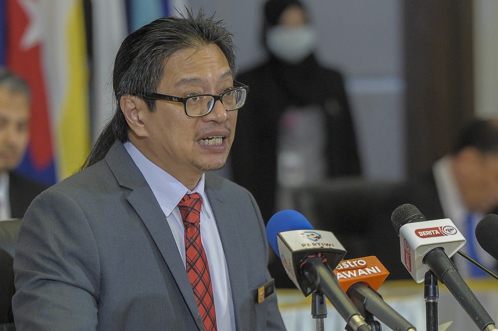 Election Commission deputy chairman Azmi Sharom speaks during a press conference on the announcement of the Slim by-election at the EC Headquarters in Putrajaya July 23, 2020. u00e2u20acu201d Picture by Shafwan Zaidon