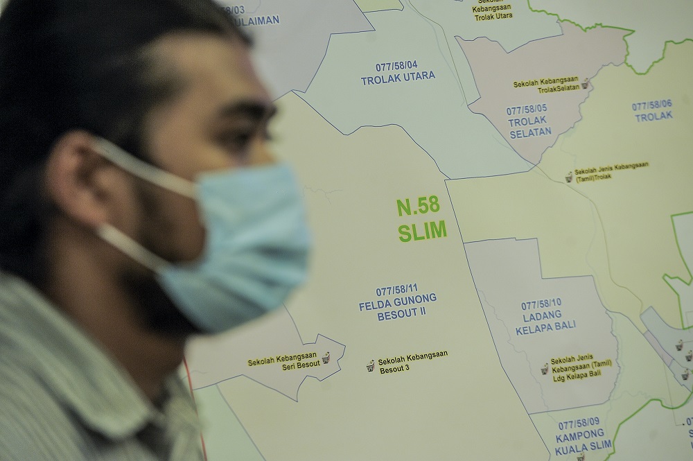 A map showing the Slim constituency is seen during a press conference at the Election Commission's Headquarters in Putrajaya July 23, 2020. u00e2u20acu201d Picture by Shafwan Zaidon