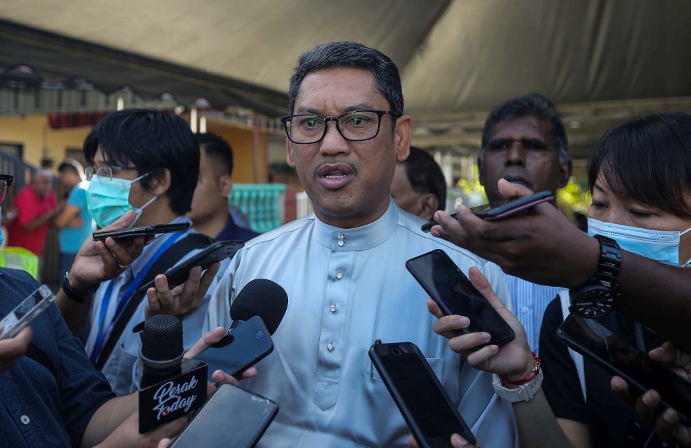 Perak Mentri Besar Datuk Seri Ahmad Faizal Azumu speaks to reporters after paying his last respects to late Perak PAS Pemuda Dewan Himpunan Pendukung chief M. Youghan in Tambun July 17, 2020. u00e2u20acu201d Picture by Farhan 