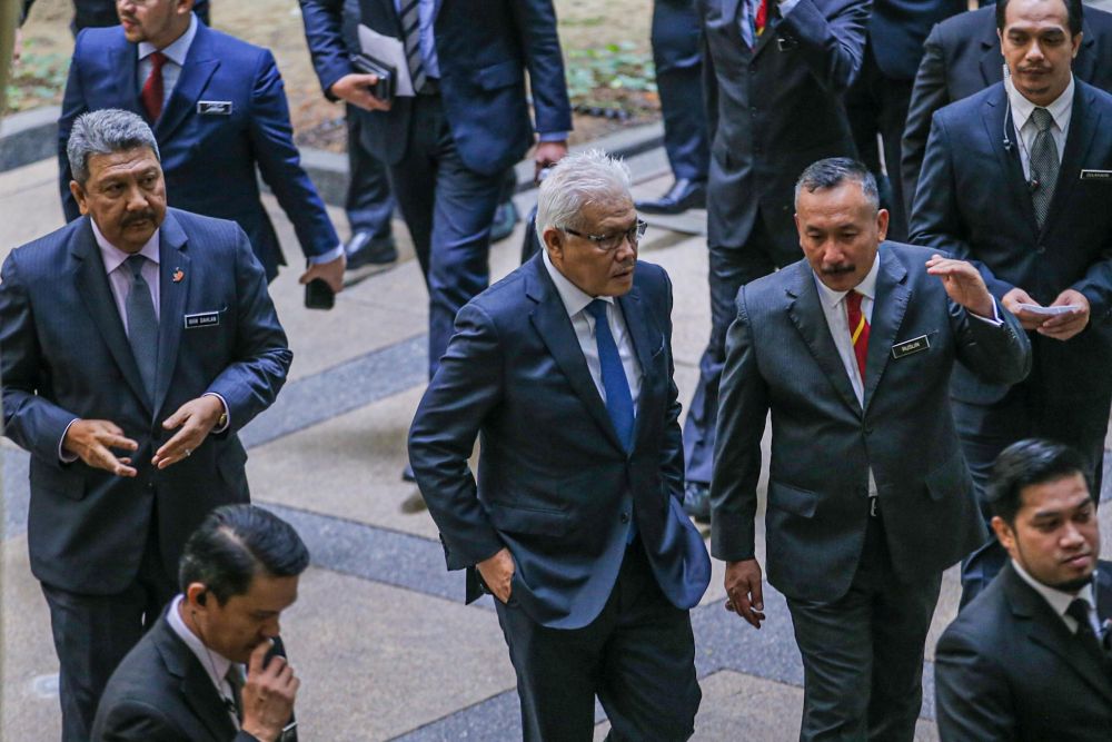 Home Minister Datuk Seri Hamzah Zainudin (centre) is pictured during a visit to the National Registration Department in Putrajaya July 20, 2020. u00e2u20acu201d Picture by Hari Anggara