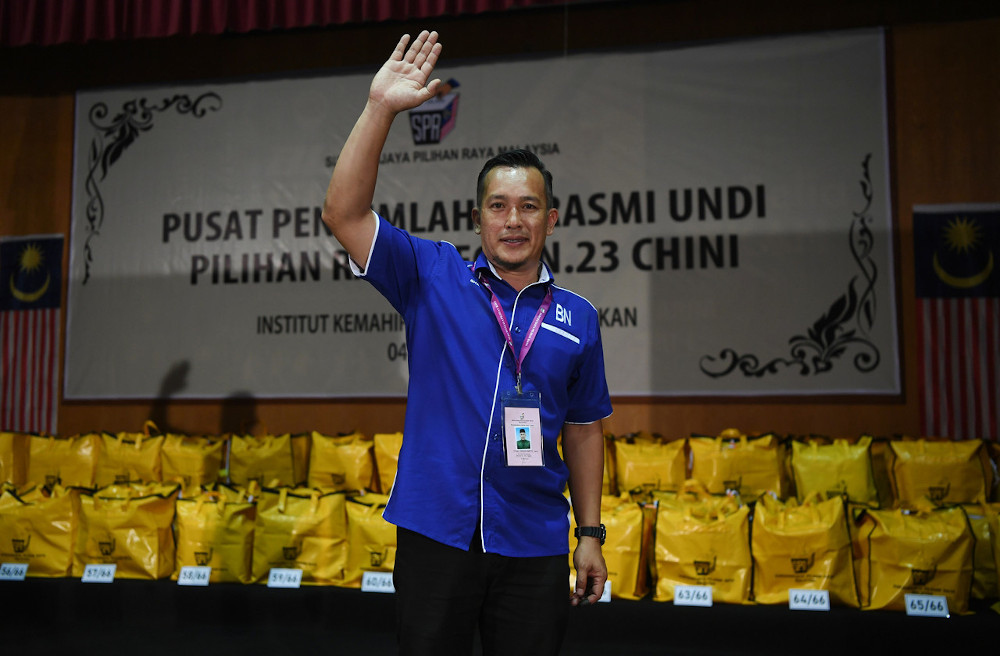 Barisan Nasional candidate Mohd Sharim Md Zain celebrates his victory for winning the Chini seat by-election at the official polling centre at the Institut Kemahiran Belia Negara, Pekan July 4, 2020. u00e2u20acu201d Bernama pic