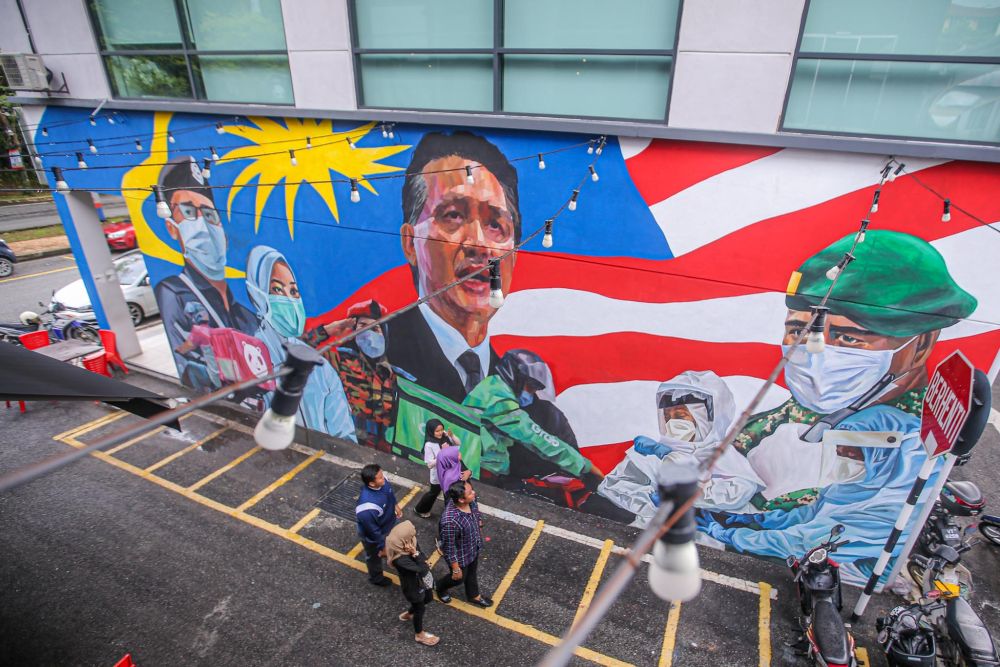 A mural depicting Covid-19 heroes is pictured in Section 4, Kota Damansara July 23, 2020. u00e2u20acu201d Picture by Hari Anggara