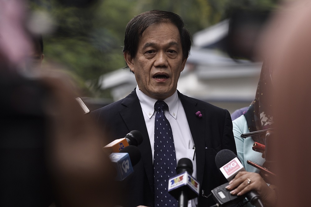 Al Jazeera lawyer Hisyam Teh Poh Teik speaks to reporters outside the Bukit Aman headquarters in Kuala Lumpur July 10, 2020. u00e2u20acu2022 Picture by Miera Zulyana