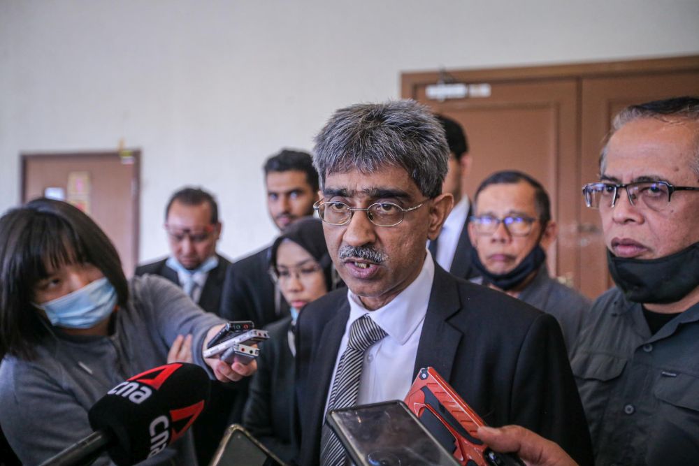 Lawyer Mohamed Haniff Khatri Abdulla speaks to reporters at the Kuala Lumpur High Court July 9, 2020. u00e2u20acu201d Picture by Hari Anggara